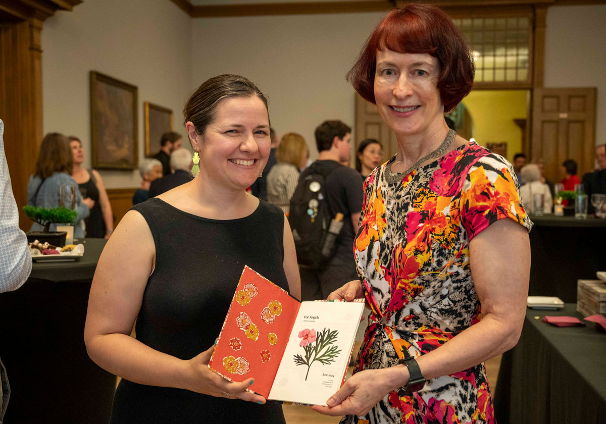 Outgoing Victoria College Principal Angela Esterhammer was also gifted a hardcover book handmade and bound by Claire Battershill, an assistant professor cross-appointed in the Faculty of Information and the Department of English, using Japanese paper and book cloth. It was decorated inside with images of pressed flowers and comments from members of the Victoria community.
